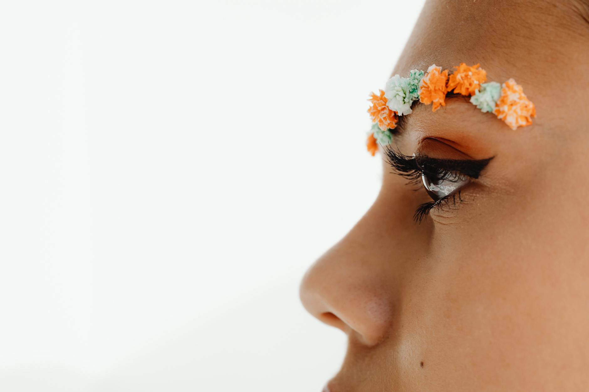 a person with floral eyebrows